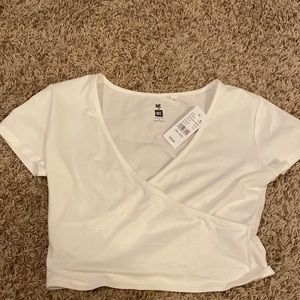 cross front white crop top with tag, never worn